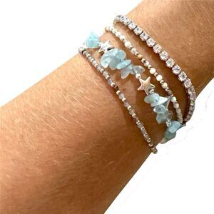 Chic Aquamarine and Silver Star Bracelet Collection and tennis bracelet